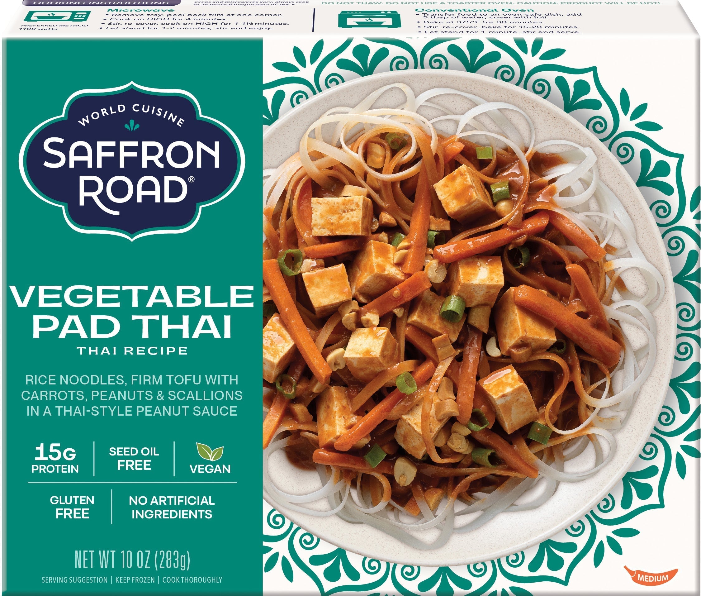 Saffron Road Vegetable Pad Thai packaging with a dish of noodles, carrots, and tofu on a white plate.