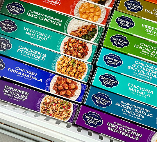 Assorted Saffron Road food packages in a freezer