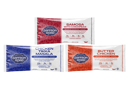 Three wrap packages of Saffron Road frozen World Cuisine products on a white background 